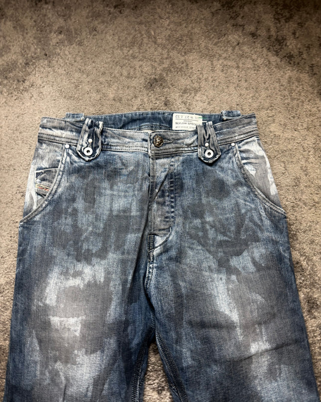 DIESEL "WASHED ZIP-FLARE" DENIM
