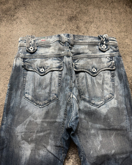 DIESEL "WASHED ZIP-FLARE" DENIM