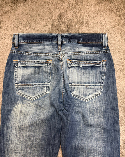 BOOTCUT “LIGHT RAYS“ DENIM